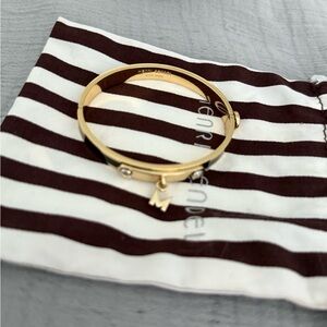 Henri Bendel Gold Enamel Bangle Bracelet with Charm